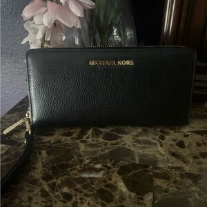 Michael Kors Black Wristlet with Gold Details